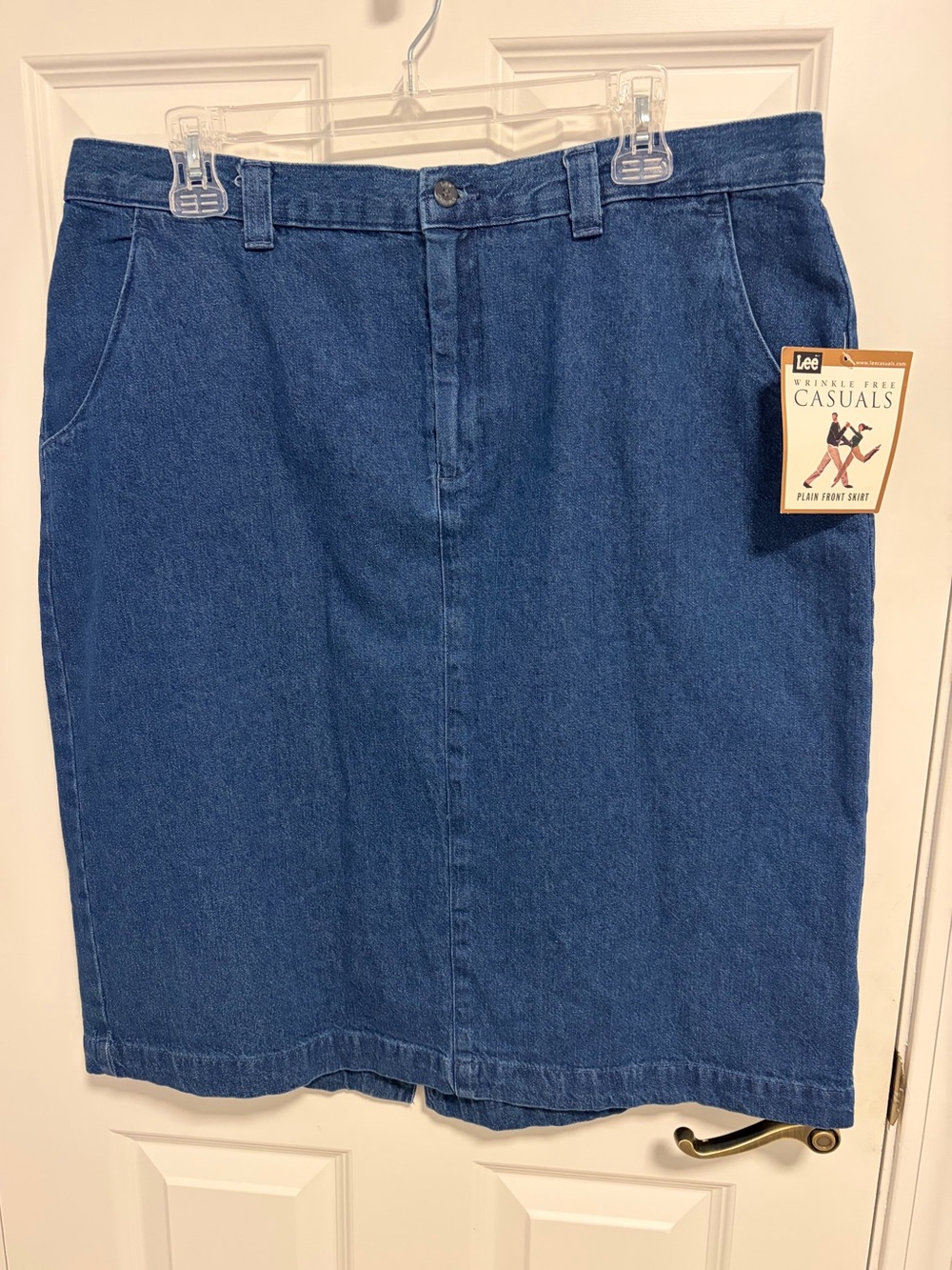 NWT Lee stonewashed denim skirt. Size 18M. Flat front. Side pockets. Button/zip
